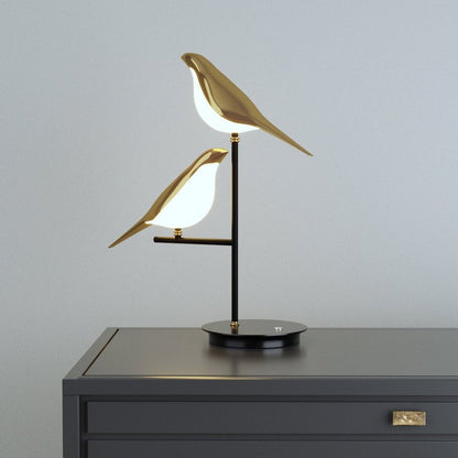 Aviara — Golden Vogel Tischlampe mit warmem Umgebungslicht